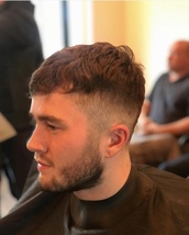 0.5 and bead trim Medium fade number 0.5 with texture at the front Pushing forward with beard time f