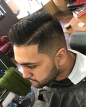 asian Persuasion Persuasion0.5 fade with beard lined up