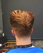 black slash taper Traditional pompadour, flowing texture with hard edges and tapered neck