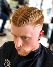 braids and fades Parted braid Faded sides keeping the straight profile and two details on the side.