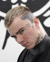 BUZZ / SKIN Natural buzz cut with a high skin fade, retaining the square shape