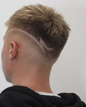 Cheeky Pattern Cropped haircut with a cheeky pattern in the side