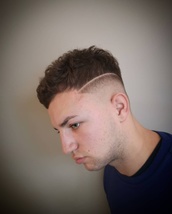 Classic curls with a twist Here we have some nice classic curls, but mixing it up with a skin fade a