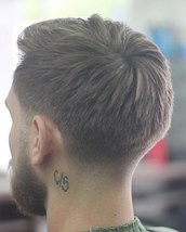 Classic haircut with a taper Classic haircut with a taper