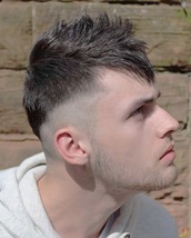 Cockatoo Spiky Moe hawk styled cut with skinner and cropped fringe