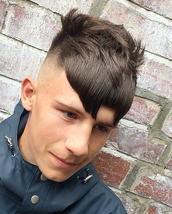 Creating shapes night owl Skin fade graduated into a modern crop with a creative twist blowdried int