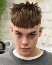 Crown crop Skin fade with cropped fringe, spiked and textured crown.