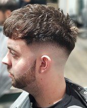 Curley wurley Dropped skin fade... Diffused to add to the curl