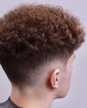 Curlsssss Curls on top with drop fade down to skin