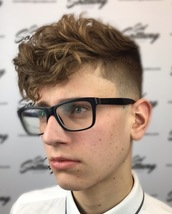 Curly top Curls for days textured top and smooth clean taper on the sides