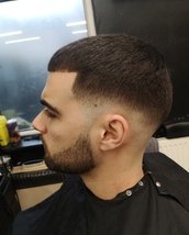 Fade and beard trim Low fade and beard trim