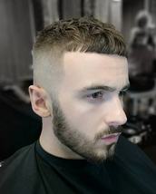 faded crop high skin fade with a textured short french crop and a beard line up