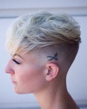 Female under cut Undercut skin fade with heavy texture through the top