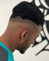 FOLLOW YOUR OWN PATH Modern pompadour finished with skinfade and detailing