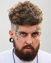 Ghost Barbers Skin fade on the back and sides, graduated out for the weight to be left in the corner