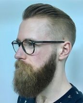 Glassy Style Using grade one on the side bland in medium to high fade , scissors cut on the top with