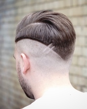 Hard part skin fade with twist Skin fade with hard part in,choppy and textured top,with sharp line c