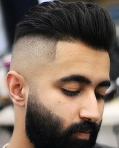 High fade High skin fade and beard line up. All natural just a cut throat to keep the edges sharp.