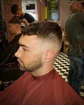 High fade High skin fade with messy combe over.