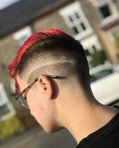 Kai Fully disconnected, double fade on one side, skin fade on the other.