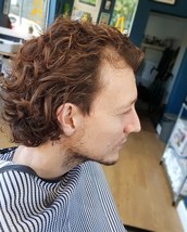 Long cut Long hair cut, razor cut for texture amd point cut to retain a masculine look. Reuzel tonic