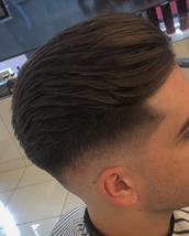 Lovely trim Skin fade, flowing back, clean lines. Very nice haircut if we say so ourselves.