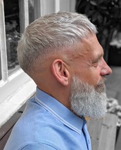 Low skin fade into a choppy modern crop Low skin fade into a choppy modern crop. Free hand technique