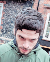 mod cut with a modern twist vertical layers were achieved around the perimeter to maintain length to