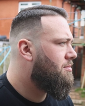 Modern London Here we have a classic skin fade but with a big beard to boost, free handed to perfect