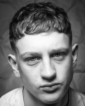 Natural Skin fade and working with natural texture through the top. Styled with salt spray and diffu