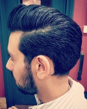 Not a clipper in sight Full scissor cut, side parted pomp with curl left for point of interest, scis