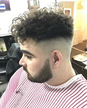 Owens and tings Red and blue perm rollers through the top.. Cut very square .. Disconnected through 