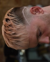 Pastel crop Fade with cropped fringe, textured finish and shaved pattern.