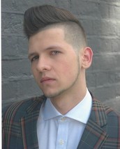 Peacock Pomp Graduated side and back down to a fade and heavily textured the top to build structure 