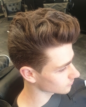 Pomp haircut Pompadour hairstyle with plenty of movement to the end result
