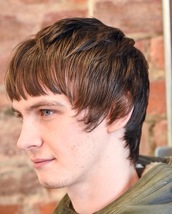 Pretty blue eyes Modern mod cut feathered and choppy finish.