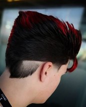 Red rum Creative layered hairstyle, with red tips to show creativity and a reverse fade tram line to