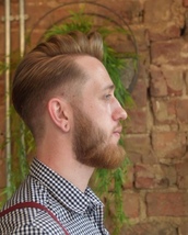 Sculpted vintage slick. Slick back parting with taper fade. Sculpted styling.