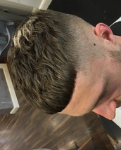 Short, Cropped and Textured Short fringe with plenty of texture through the top. Sides have been fad