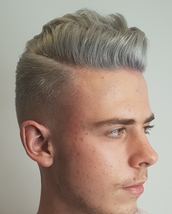Side pomp hairstyle Pompadour hairstyle adding a touch of silver for the desired look