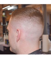 Skin fade Skin fade with crop top sharp flick.