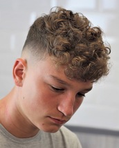 Skin fade Skin faded with them curls that get the girls