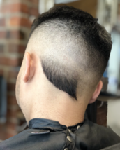 skin fade and creativity Proper skin fade with a little creativity at the back which makes the hairc
