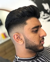 Skin fade push back Skin/Beard fade and pushed back on top.