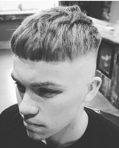 Skin faded crop Texture through the top with a blunted fringe, bald fade on the back and sides for c