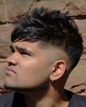 Skinner Skin fade with heavy textures on top