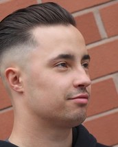 Slick rick Skin fade slicked back on top