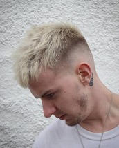 Smooth criminal Blond Choppy crop featuring a smokth fade