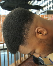 Smooth fro Skin fade into a smoothed afro