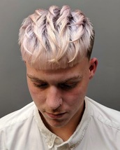 Spiral Crop Skin fade with sharp outlines. Cropped fringe with spiralled spikey texture.